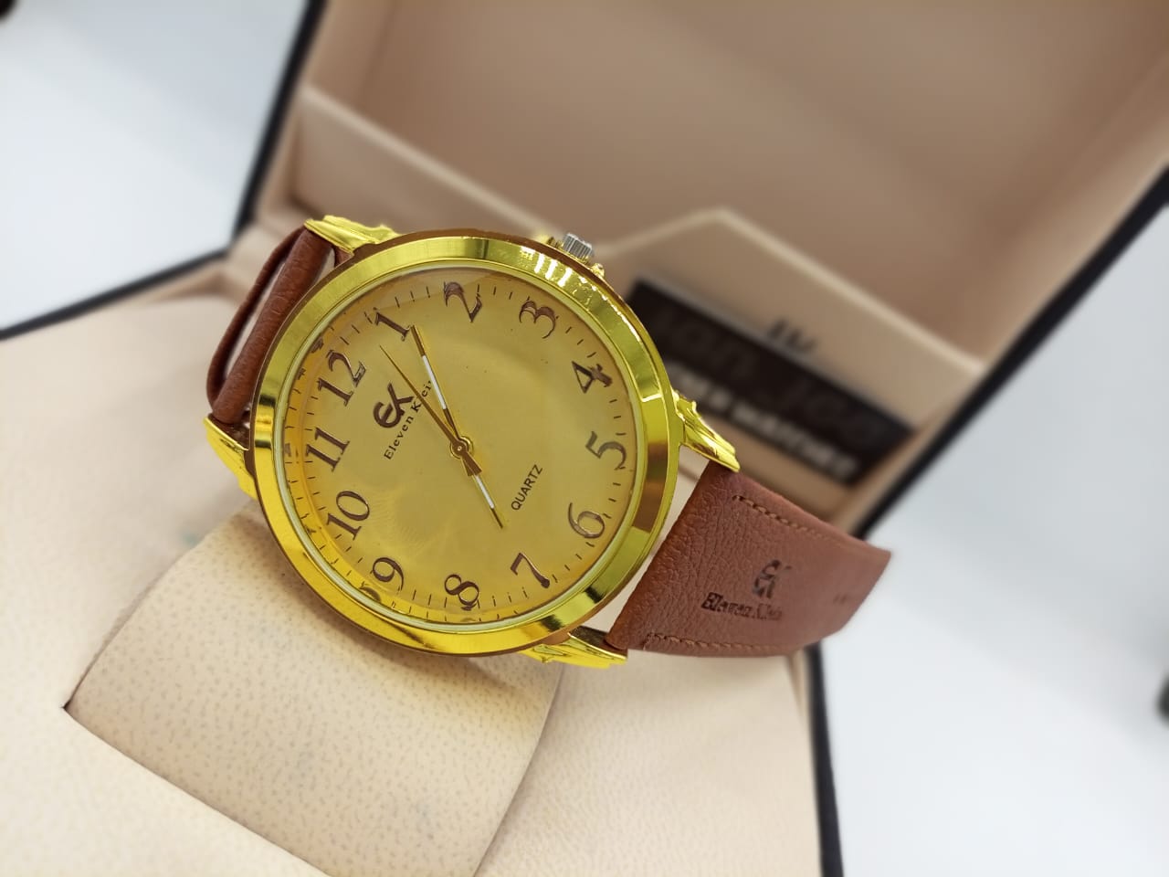 Eleven Klein Quartz Golden Round Dial Brown Strap Watch